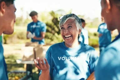 Discussion between charity volunteers outdoors