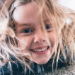 Playful portrait of cute little girl