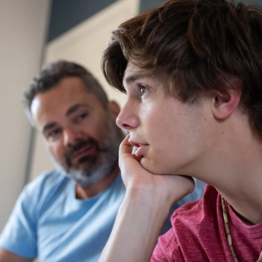 Young man talking with his father